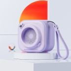 Mini camera-shaped Bluetooth home speaker